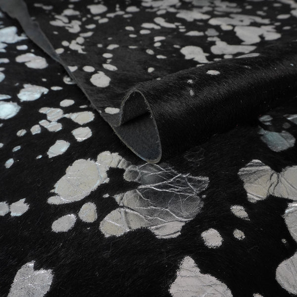 Retal de vacuno pelo negro con manchas plateadas