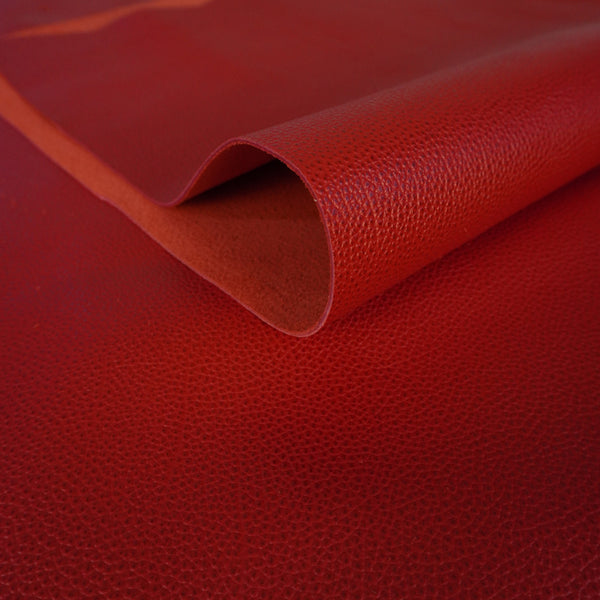 Vacuno grabado con fondo oscuro rojo