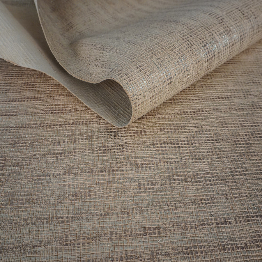 Piel de cabra grabada oro